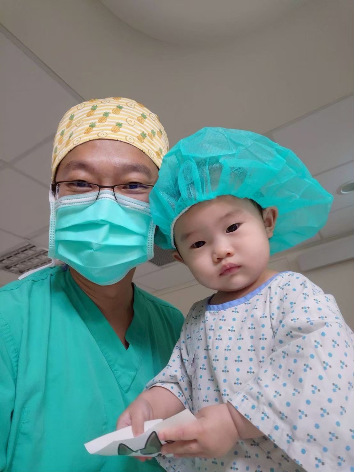 Dr. Marco Ha and his daughter before her upper lip frenulum procedure
